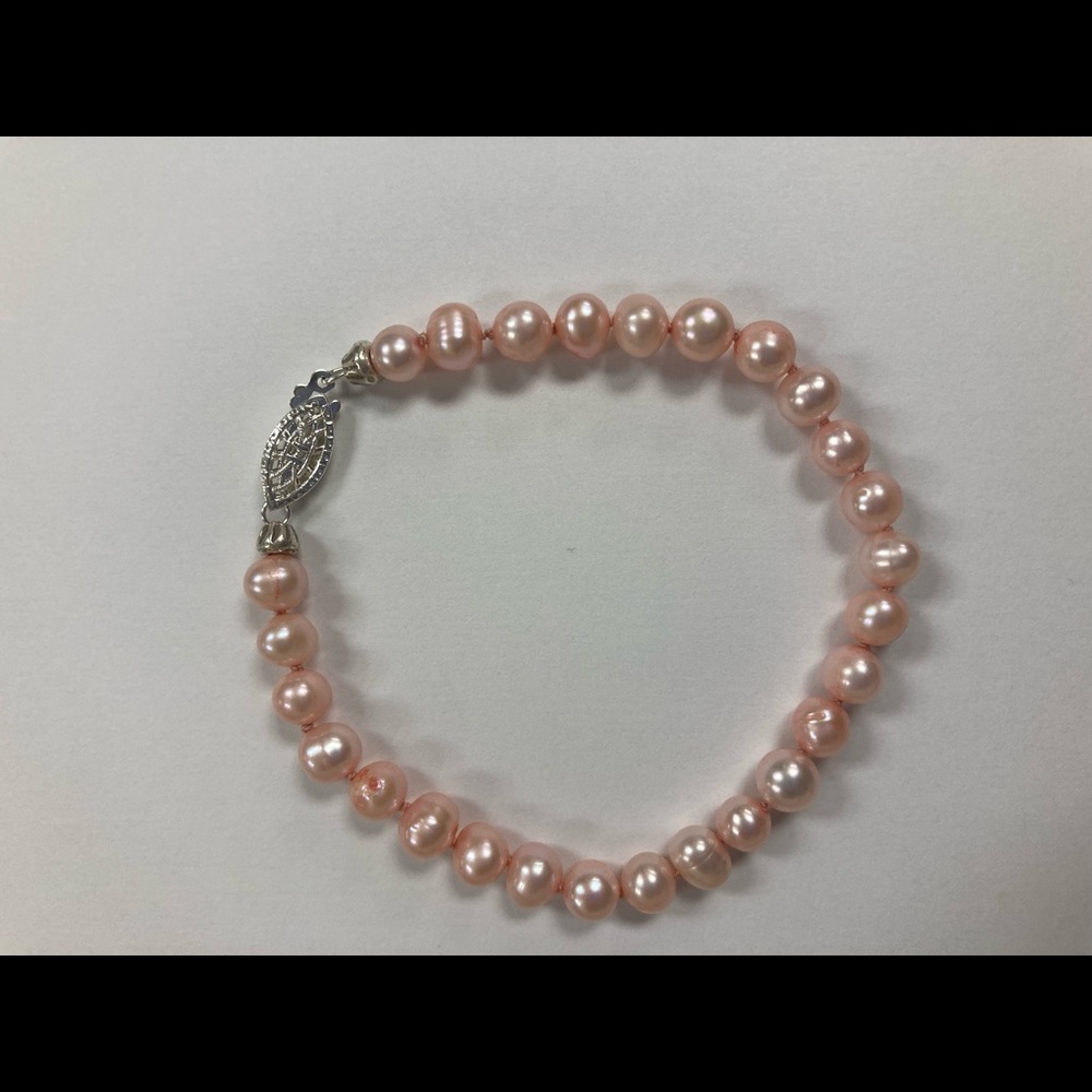 Freshwater pink pearl bracelet 8 inches long with sterling silver clasp